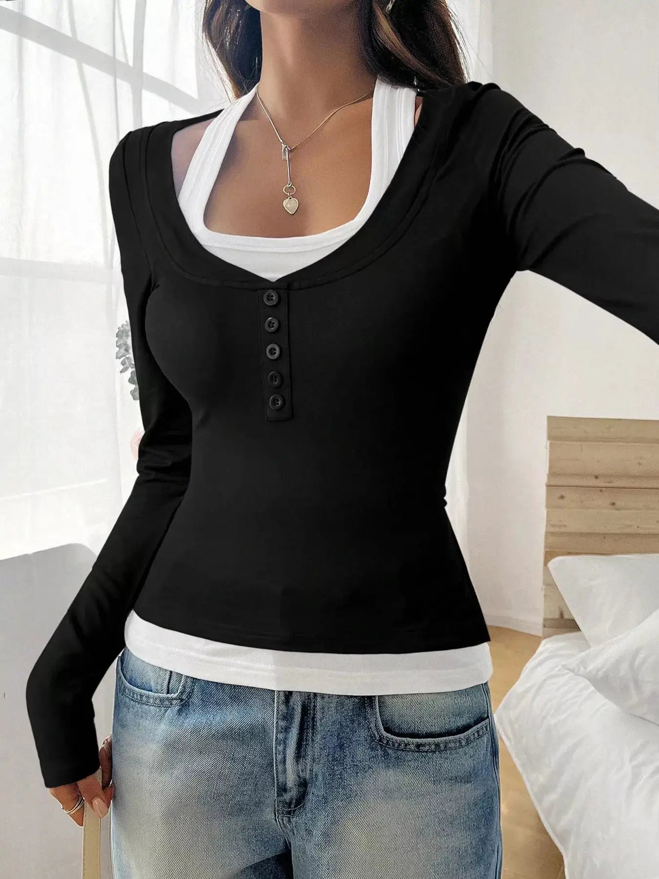 Scoop Neck Long Sleeve T-Shirt in black with white underlayer and button placket