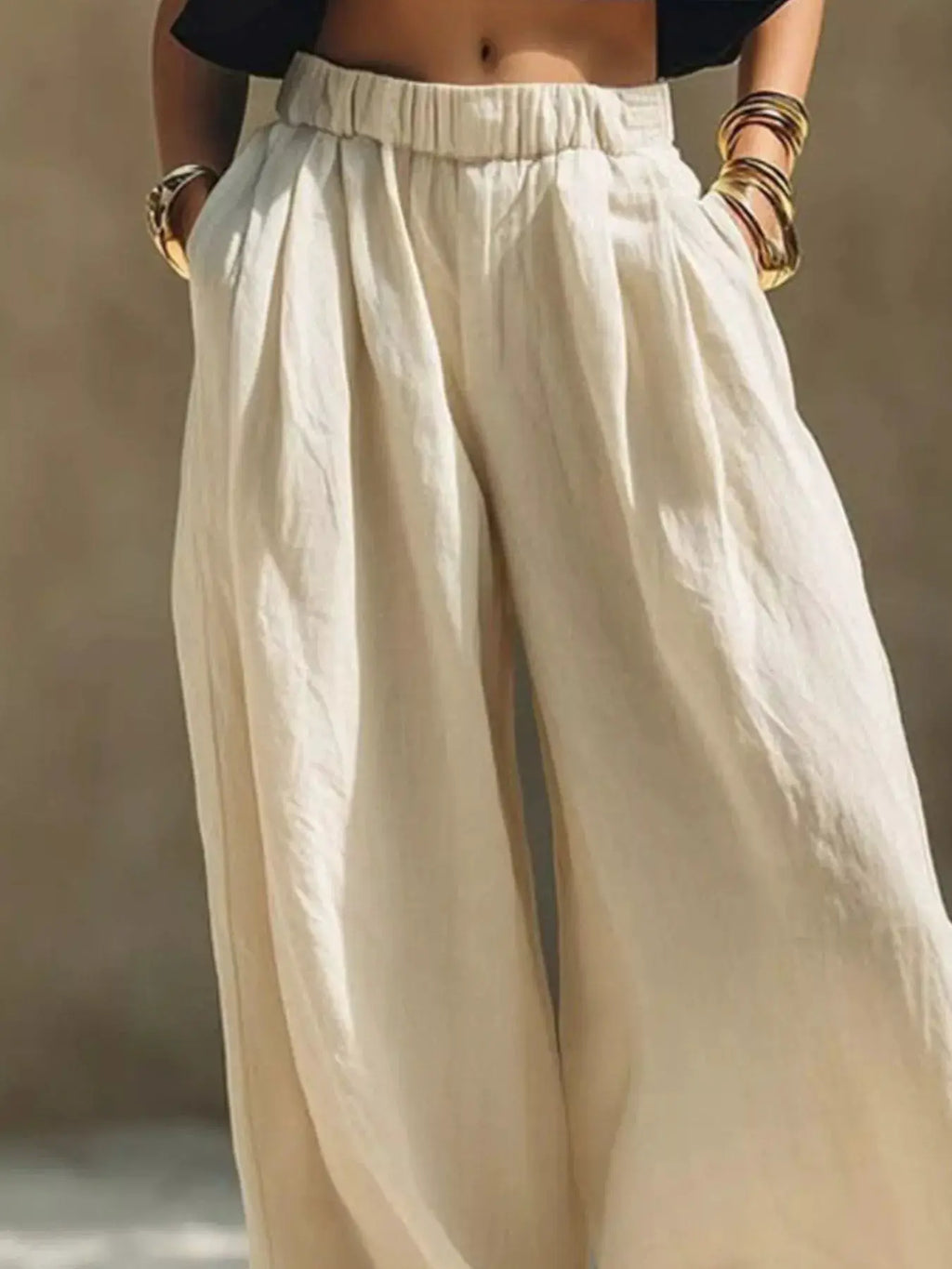 Plus-size wide-leg pants with elastic waistband in cream