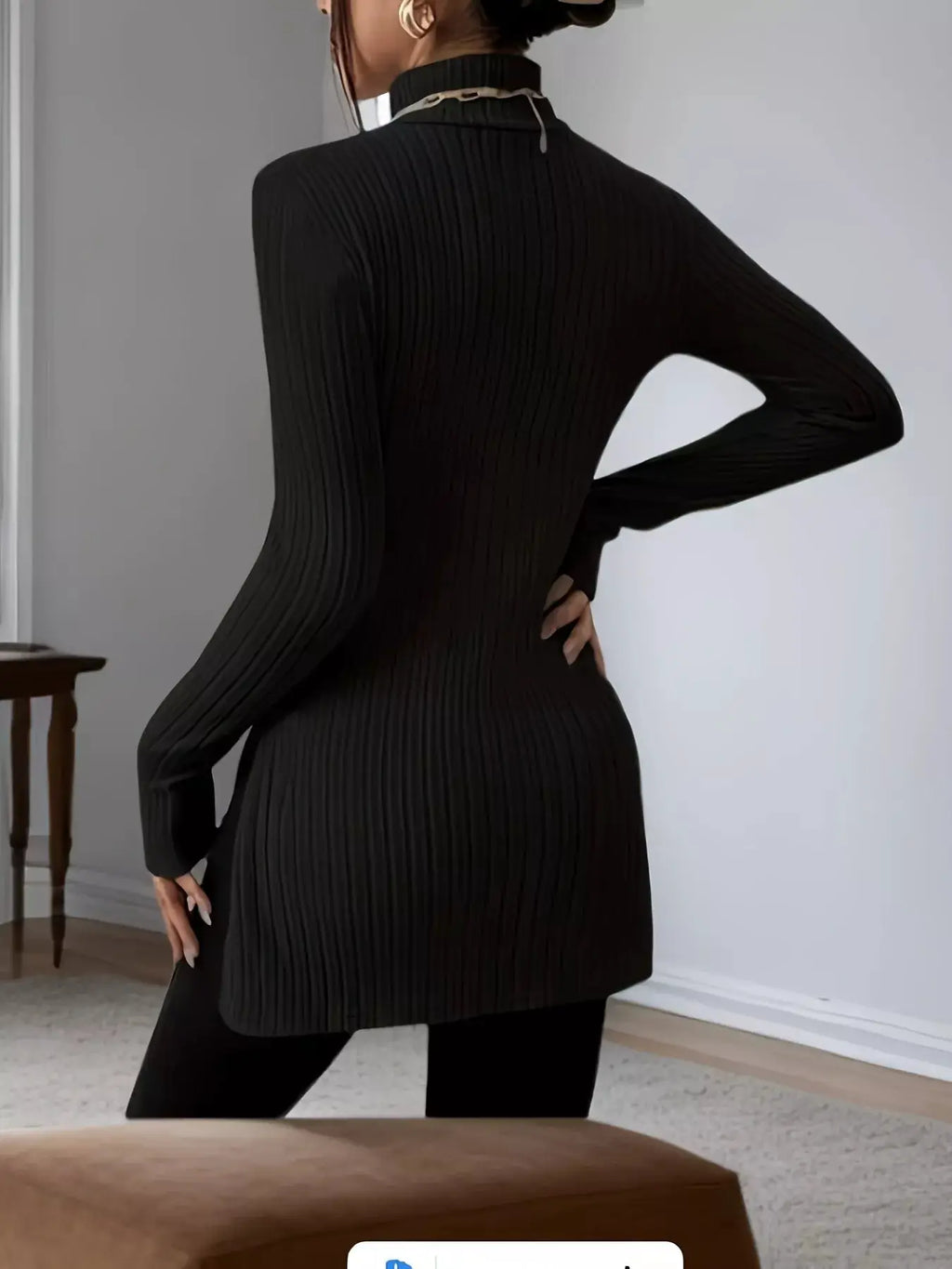 Plus-size ribbed black turtleneck long-sleeve top by Belle Bijouix with slit