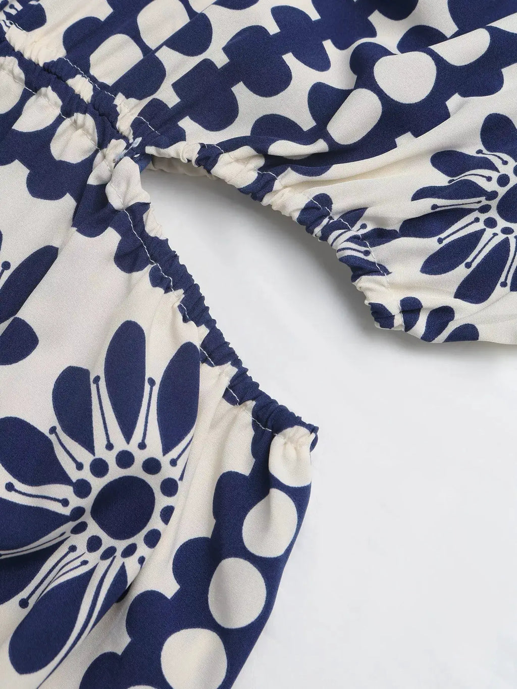 Floral Print Cutout Waist Maxi Dress by Belle Bijouix in navy and white with a slit