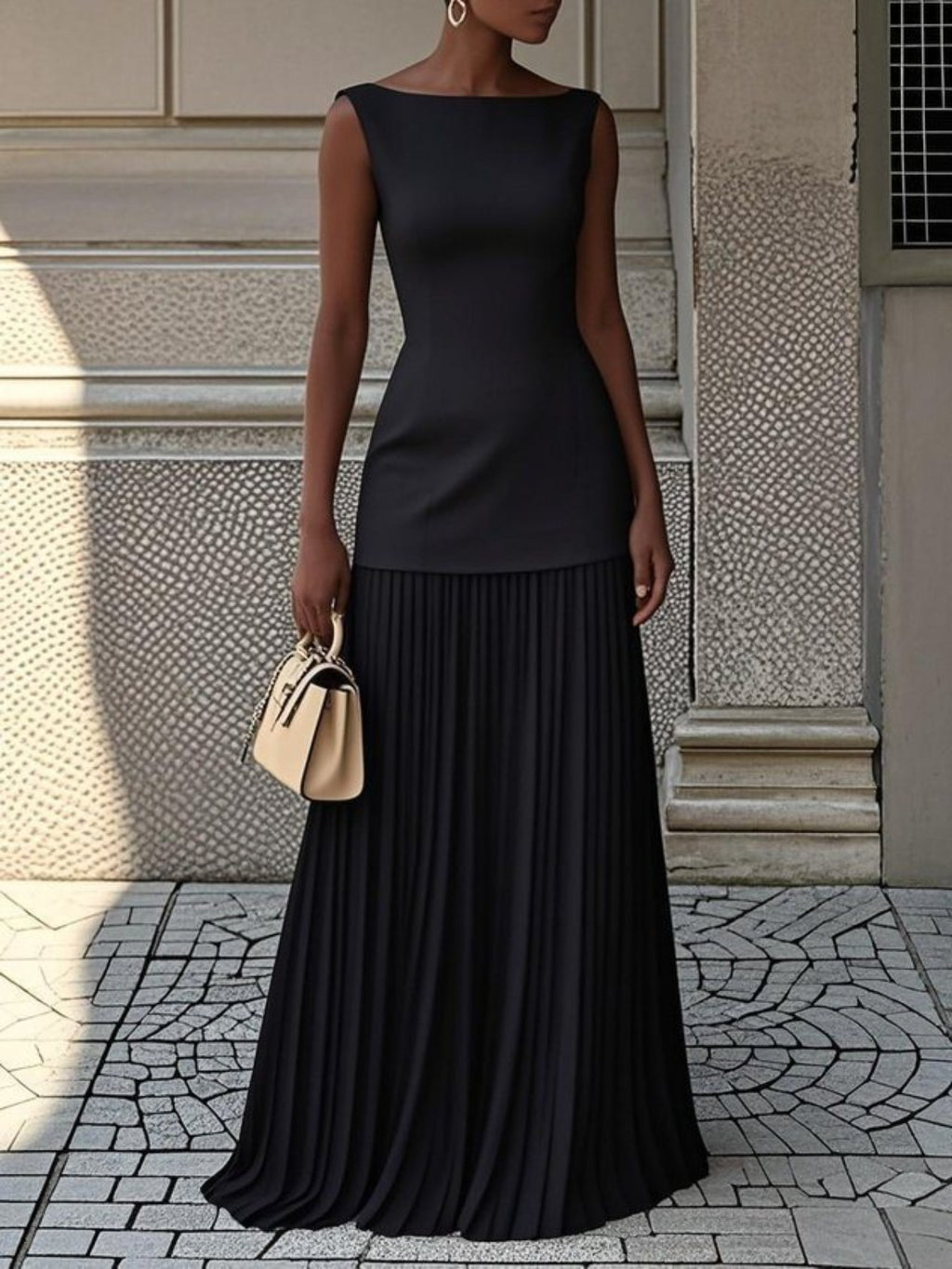Sleeveless black pleated maxi dress by Bellebijouix, floor-length wedding & bridal party gown.