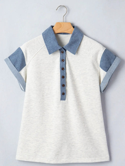 Contrast Trim Button Detail Top by Trendsi; cream body with blue denim-style collar placket and cuffs on a hanger