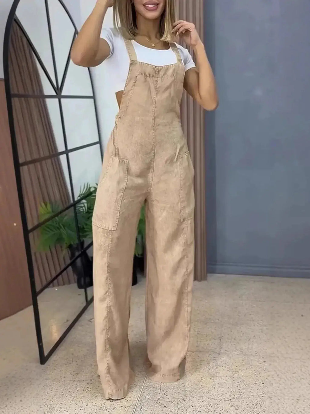 Overalls beige washed denim with wide legs and cargo pockets