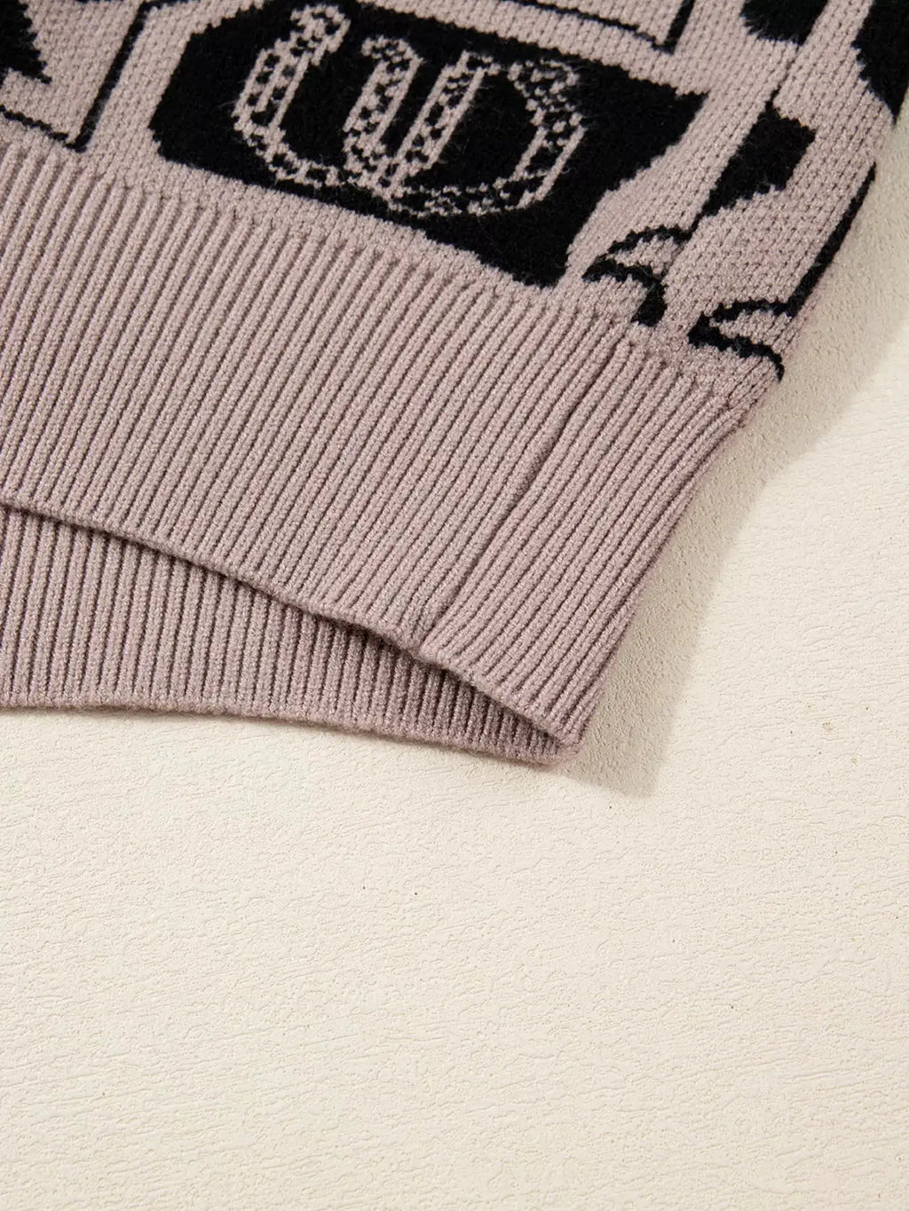 Bows & Horseshoes Pattern Round Neck Sweater in lavender knit with ribbed hem