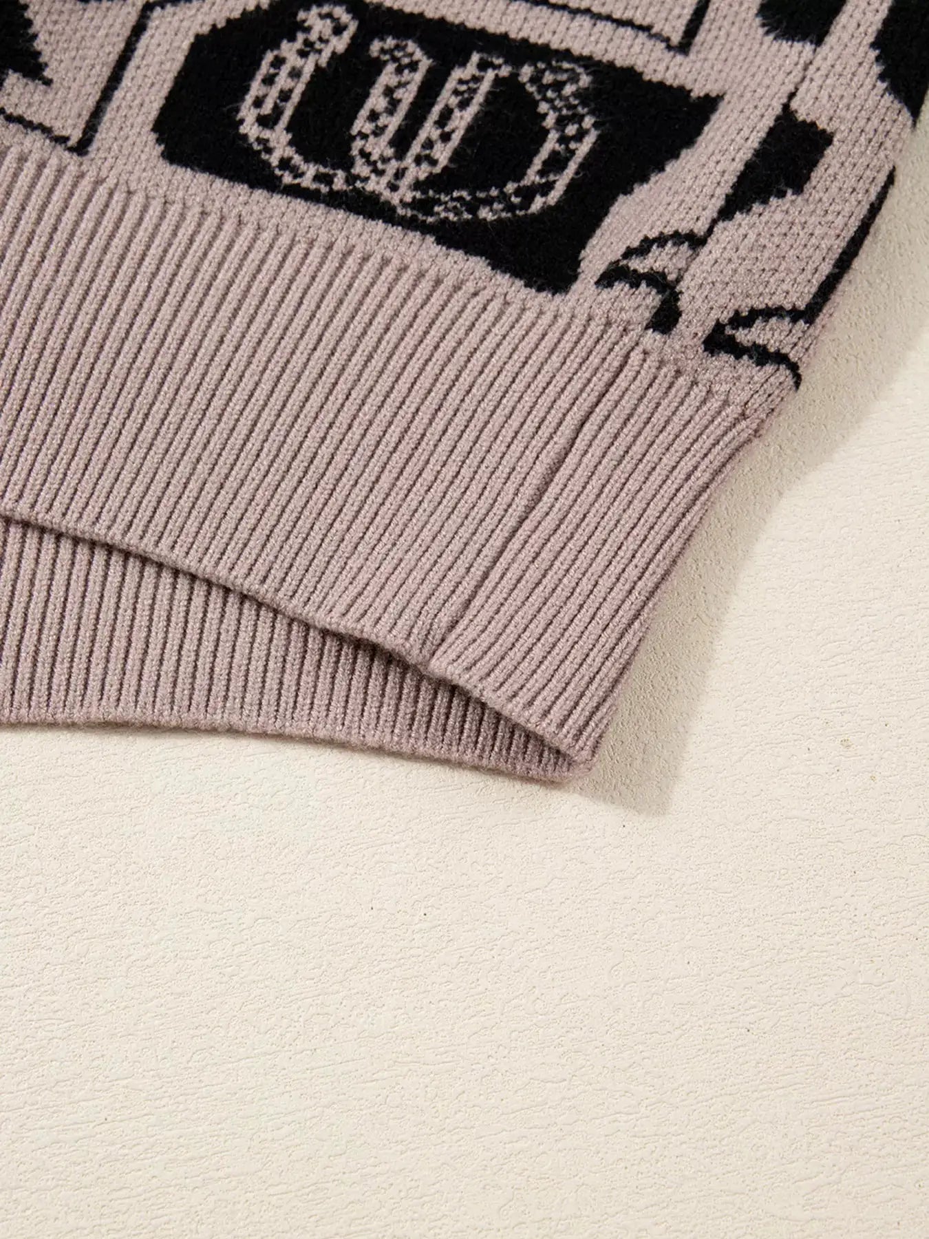 Bows & Horseshoes Pattern Round Neck Sweater in lavender knit with ribbed hem