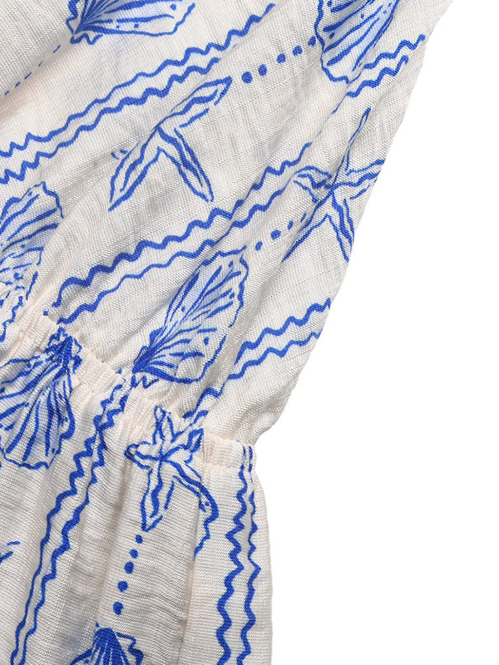 Seashell Print V-Neck Sleeveless Romper by Bellebijouix on white fabric with blue seashell pattern