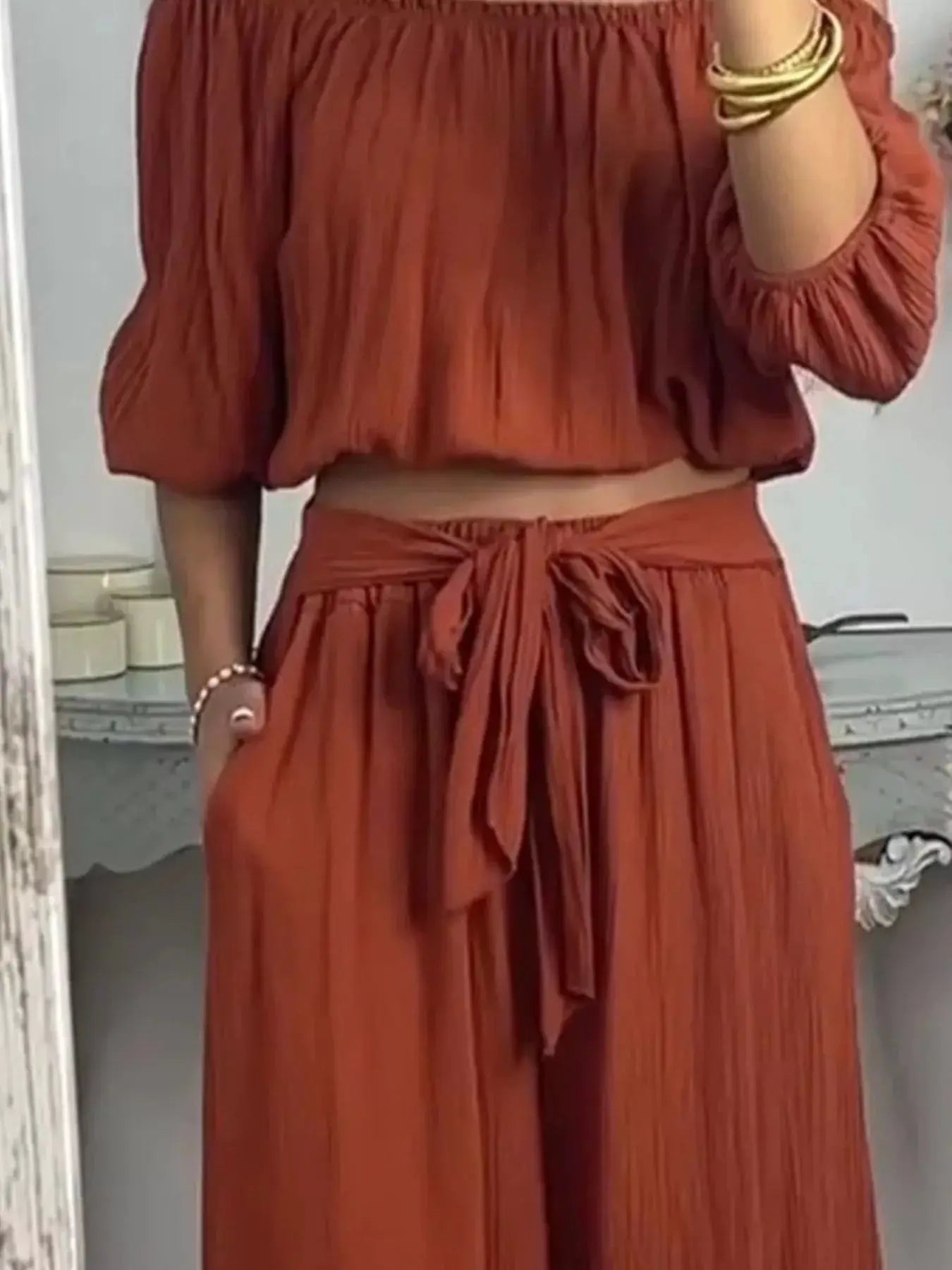 Full Size Off-Shoulder Top and Pants Set, rust-toned loungewear with a tied waist belt.