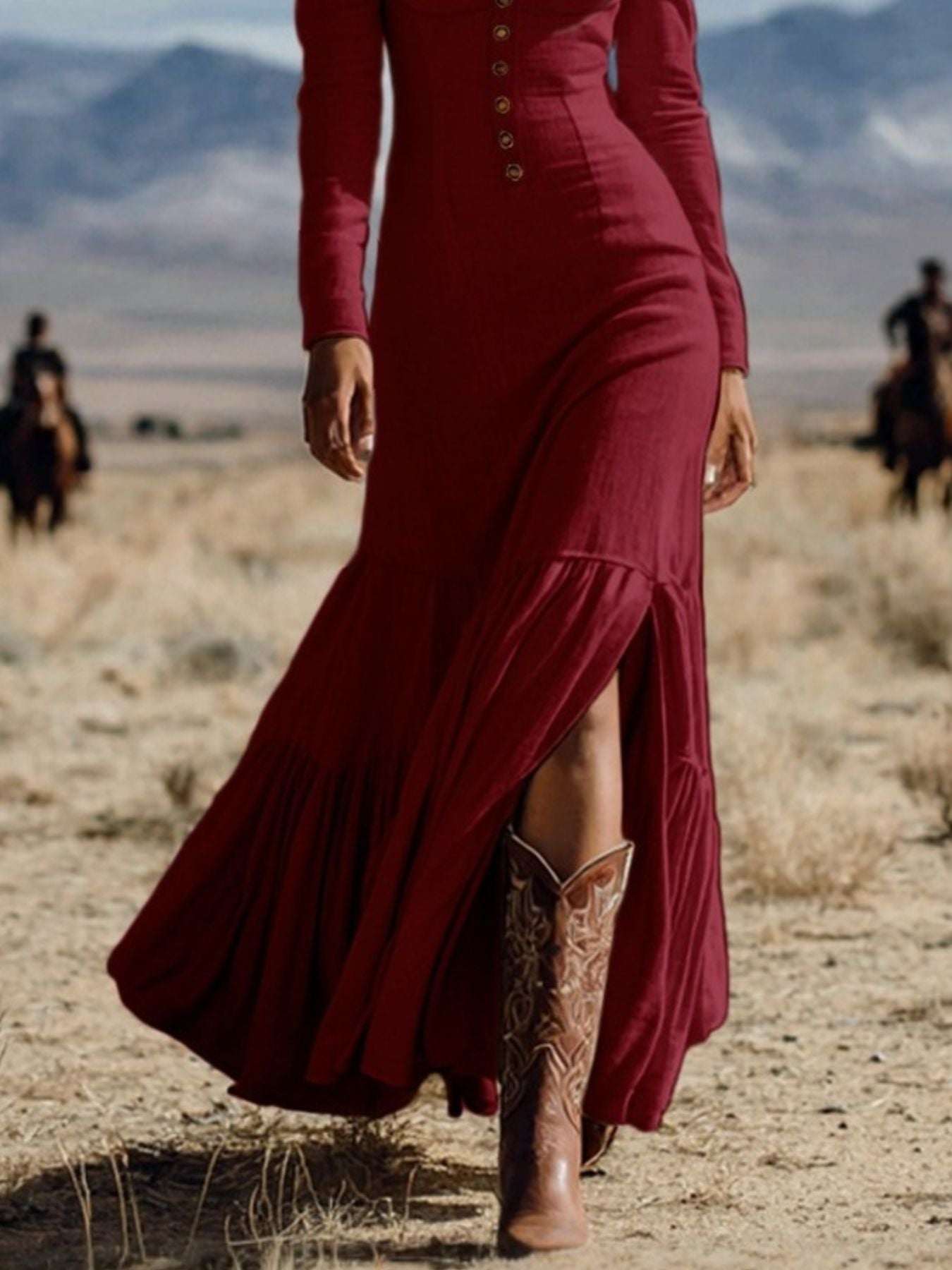 Slit long sleeve tiered maxi dress in burgundy by Trendsi, button-front; shown with cowboy boots in a desert setting