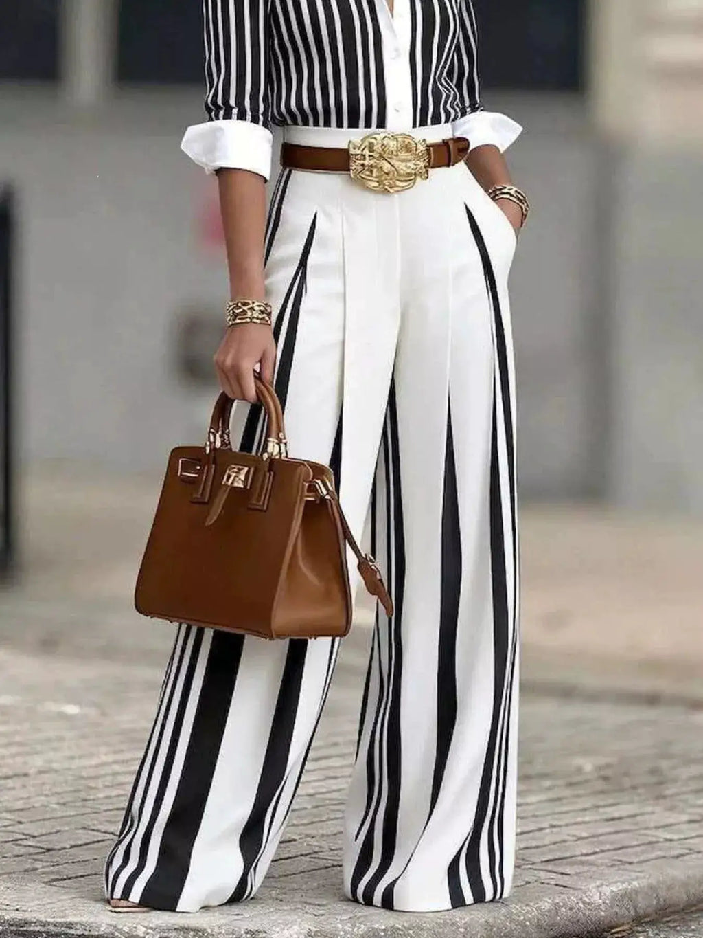 High-Waisted Wide-Leg Striped Pants with black-and-white vertical stripes and a brown belt