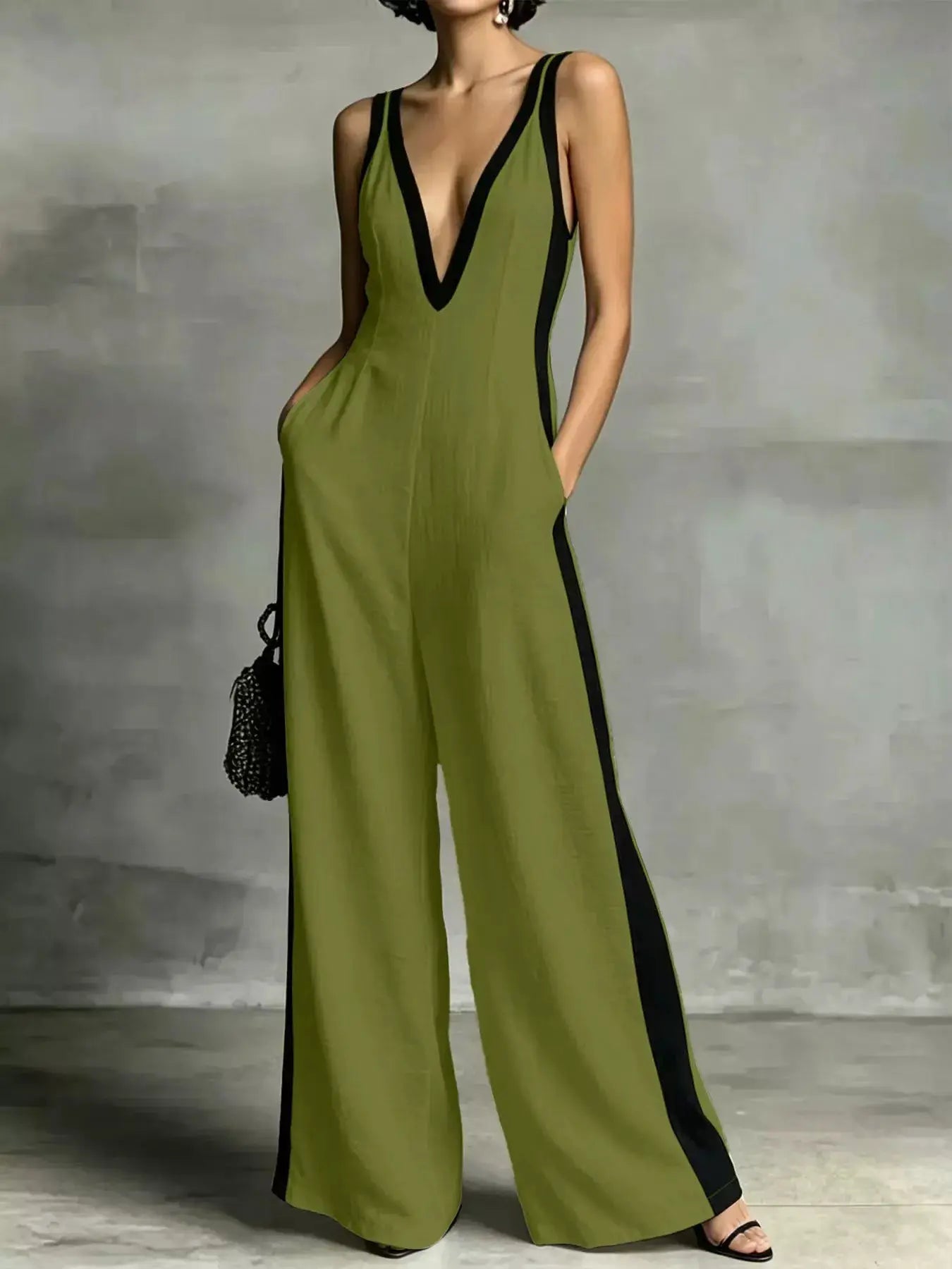Deep V-Neck Wide-Leg Jumpsuit in olive green with black contrast trim and side pockets