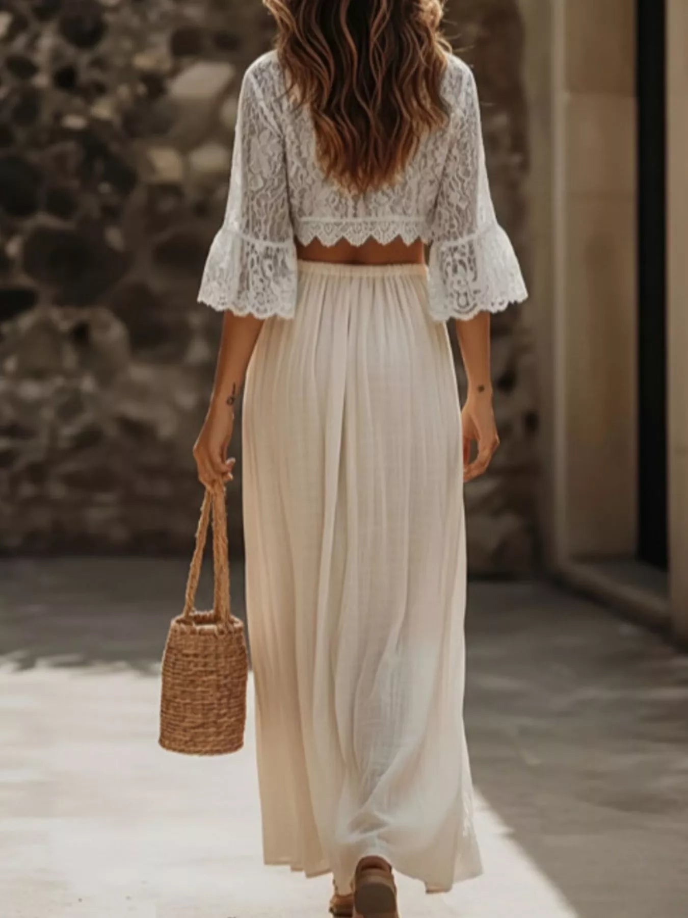 Lace Crop Top and Slit Maxi Skirt Set in white; delicate lace top with bell sleeves and a flowing skirt