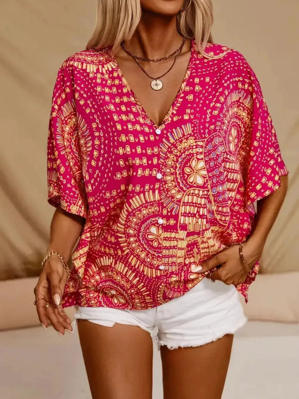 Printed V-Neck Half Sleeve Top by Belle Bijouix, pink with abstract pattern