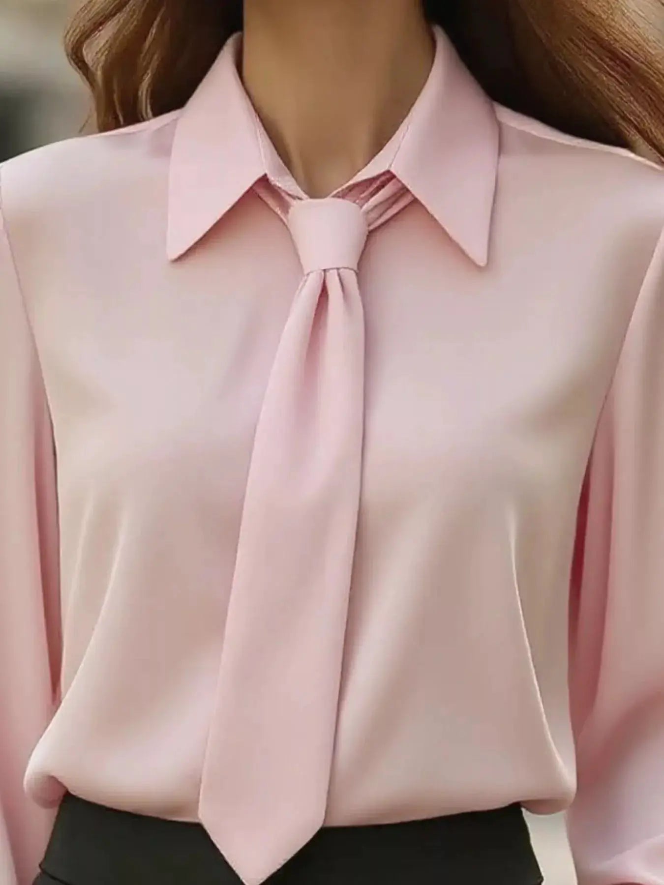 Collared neck long sleeve blouse by Belle Bijouix in pink with front tie.
