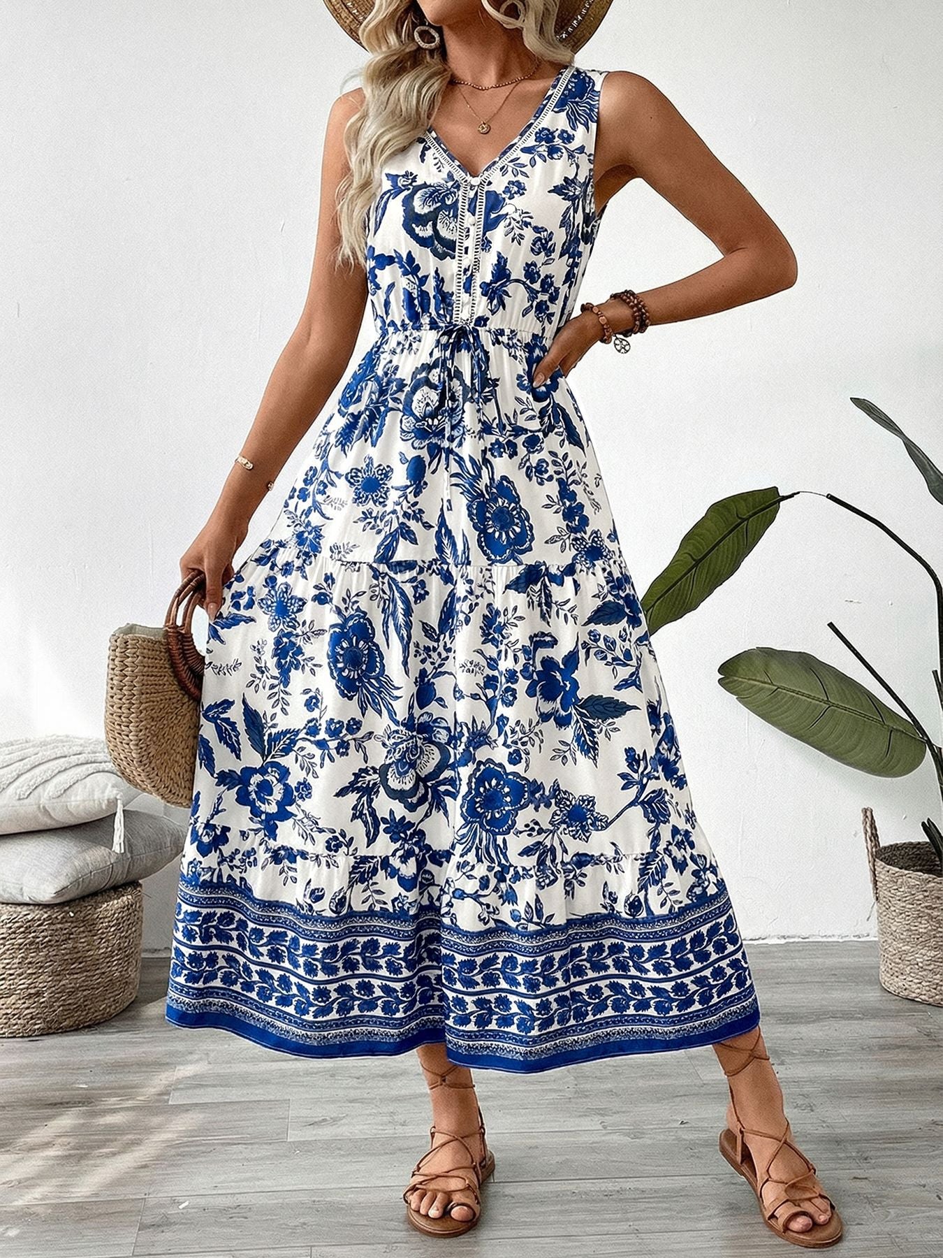 Bellebijouix floral print sleeveless V-neck midi dress with belted waist and tiered skirt in blue on white