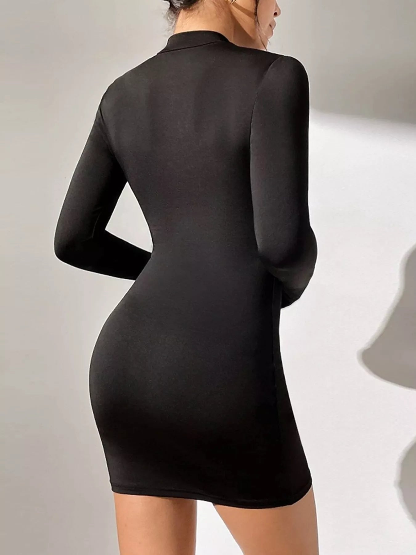 Mock neck long-sleeve bodycon mini dress by Belle Bijouix in black