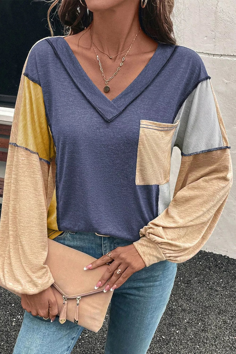 Color Block V-Neck Long Sleeve T-Shirt by Belle Bijouix; blue body with multicolor patchwork sleeves and chest pocket