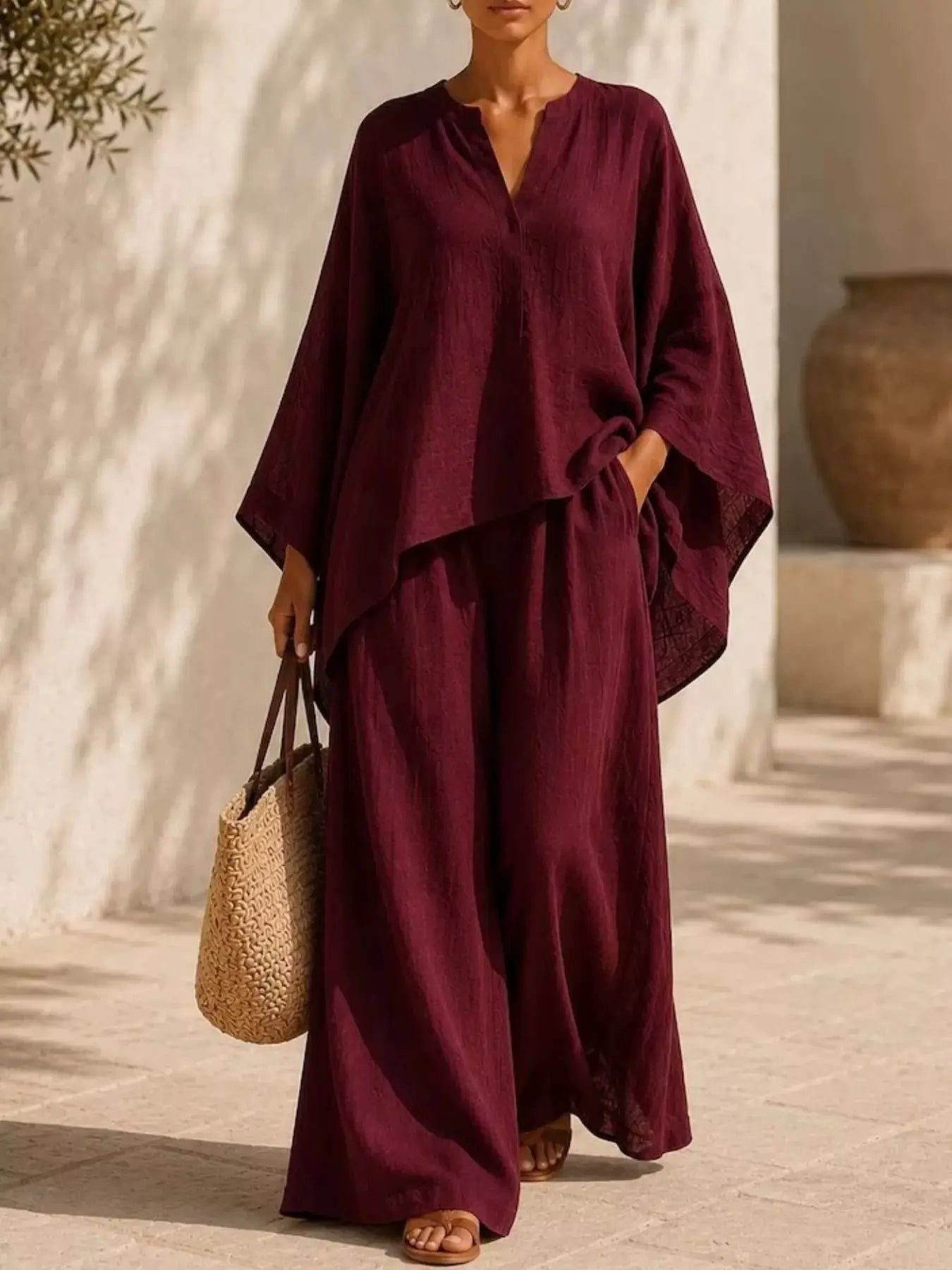 Plus Size Notched Long Sleeve Top & Wide Leg Pants Set in burgundy, flowy two-piece outfit.