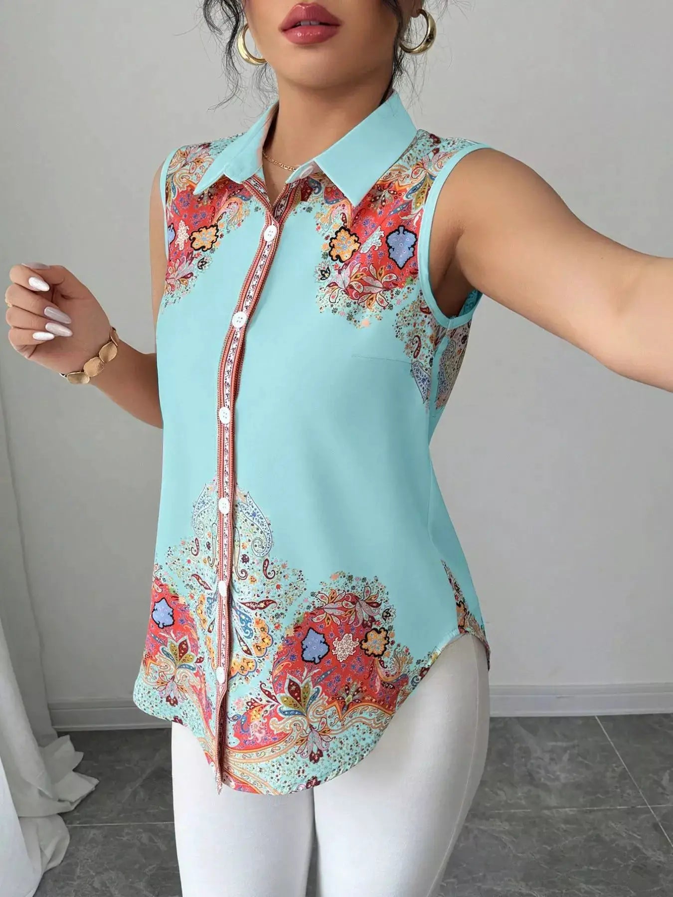 Button Up Sleeveless Shirt by Belle Bijouix in aqua with paisley floral print and light blue collar
