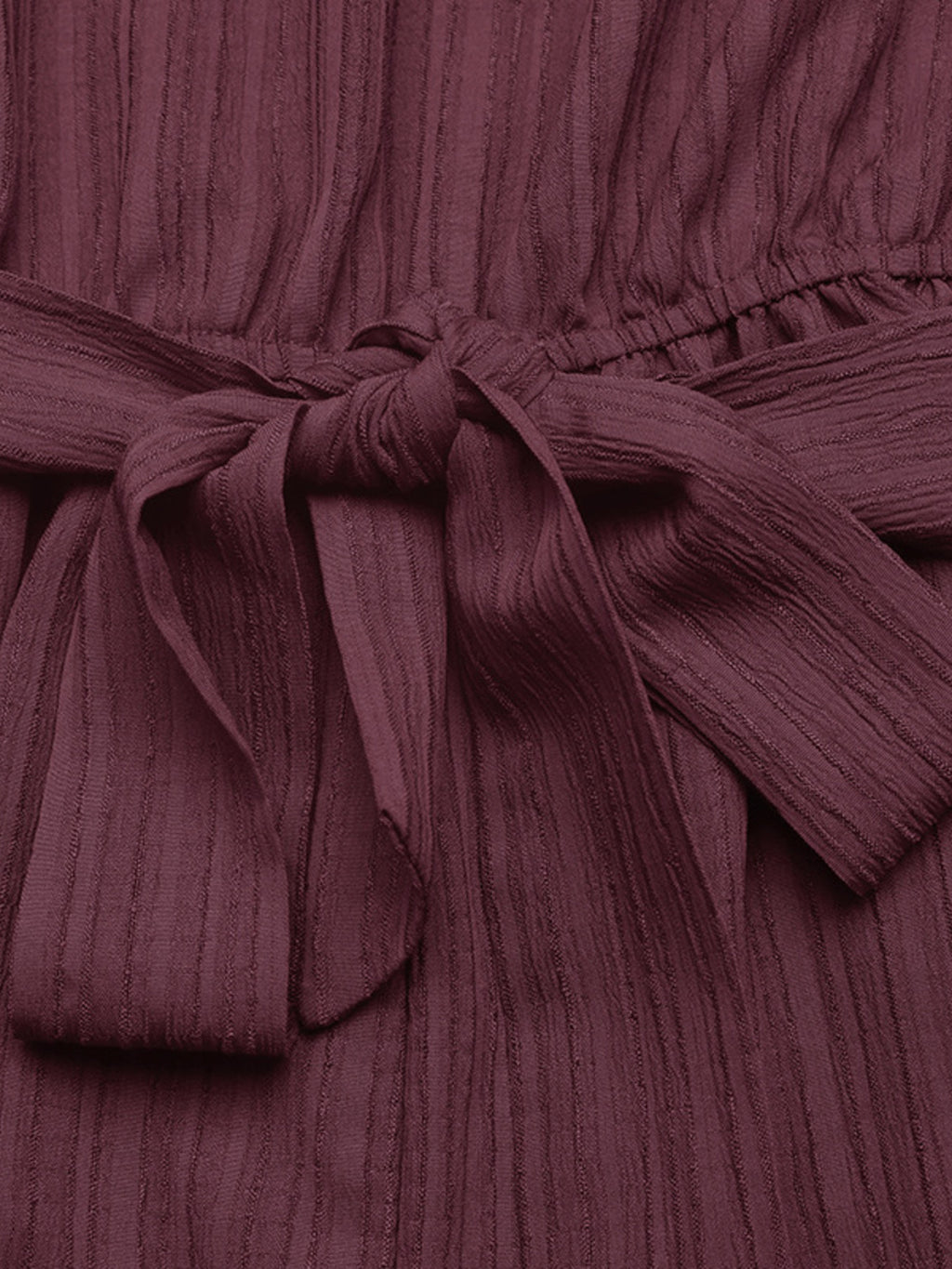 One-Shoulder Tie-Waist Romper in burgundy ribbed fabric