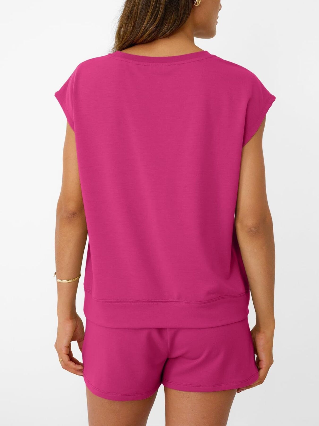 Round-neck cap-sleeve magenta top with matching shorts set, back view, highlighting relaxed fit and bright color by Trendsi