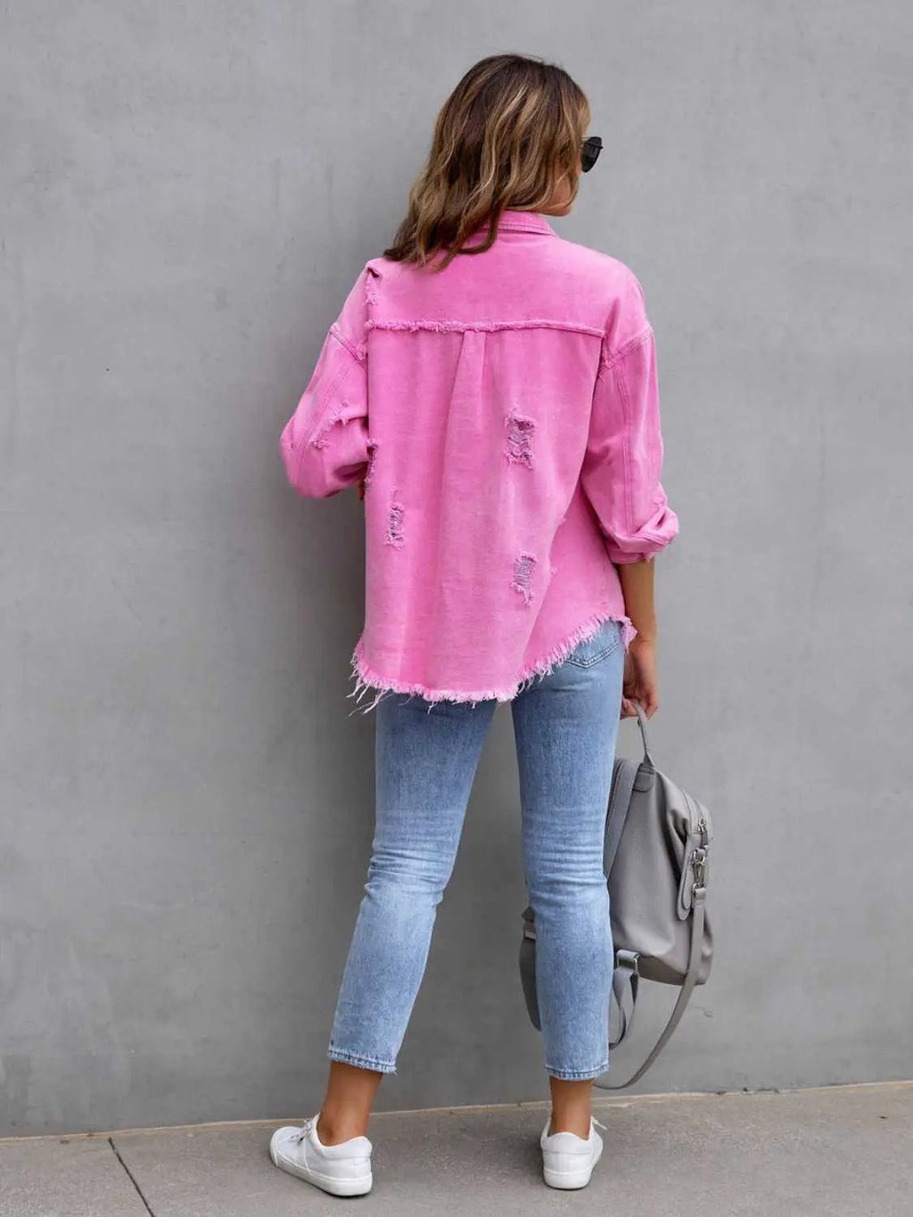 Distressed Drop Shoulder Denim Jacket, pink; oversized fit with frayed hem.