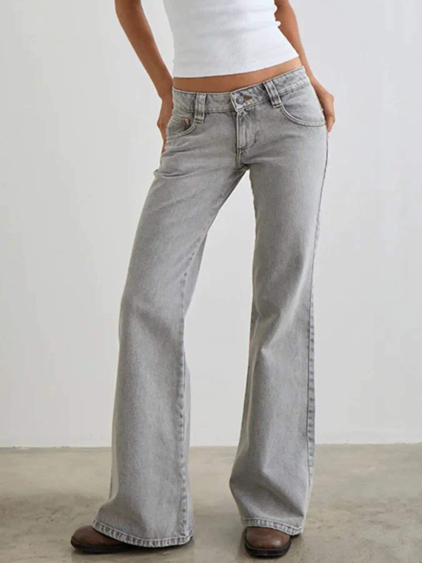 Low Rise Flare Leg Jeans by Belle Bijouix in light wash denim with pockets and buttoned front