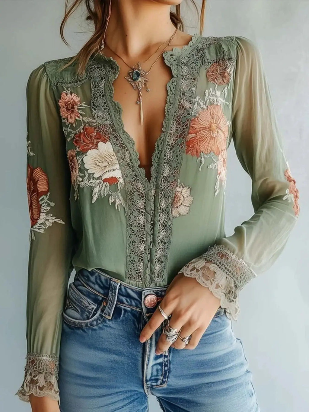 Lace Detail Floral Blouse in sage green with sheer sleeves and scalloped lace trim.