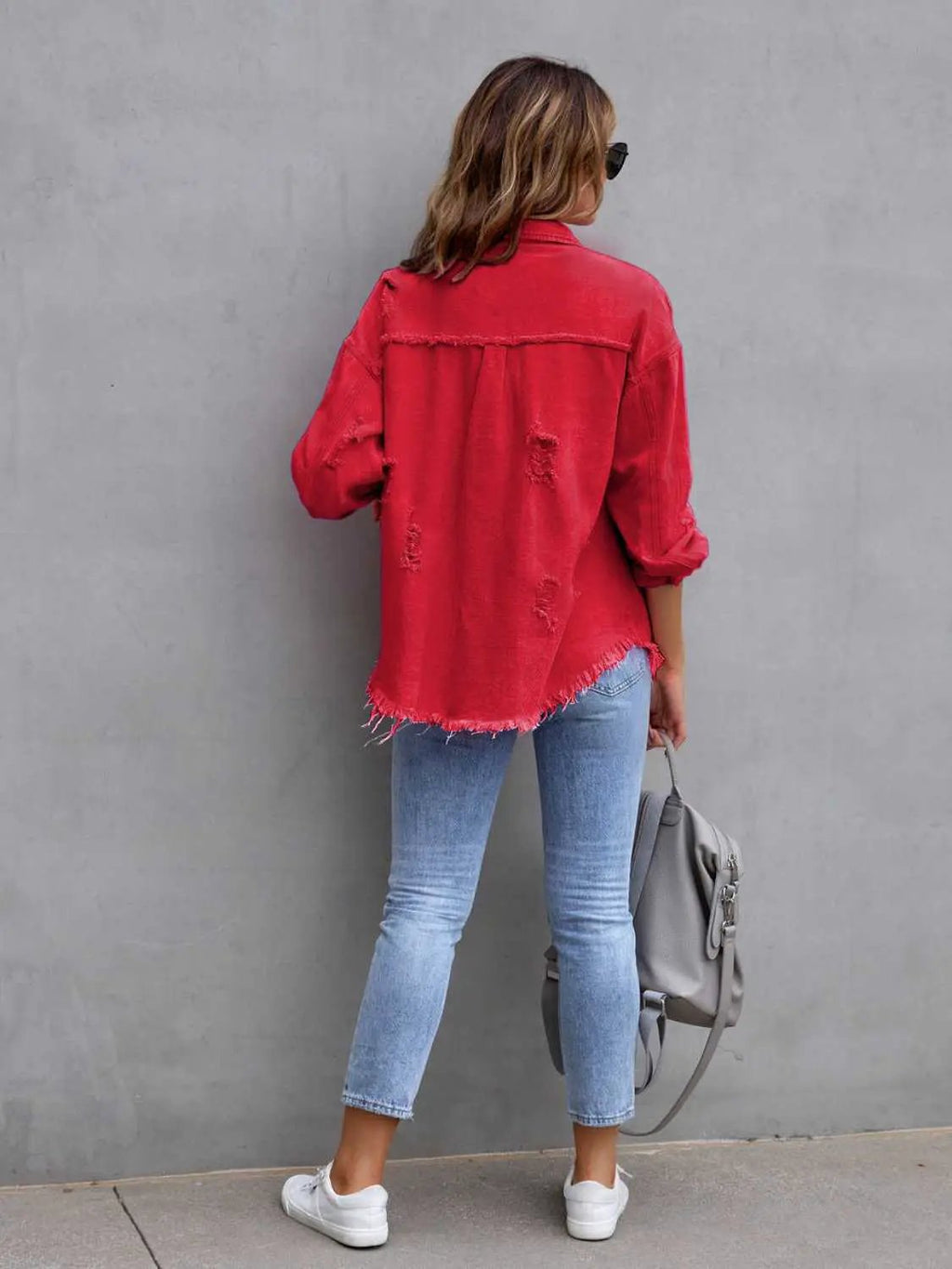 Distressed Drop Shoulder Denim Jacket in red with frayed hem and relaxed fit
