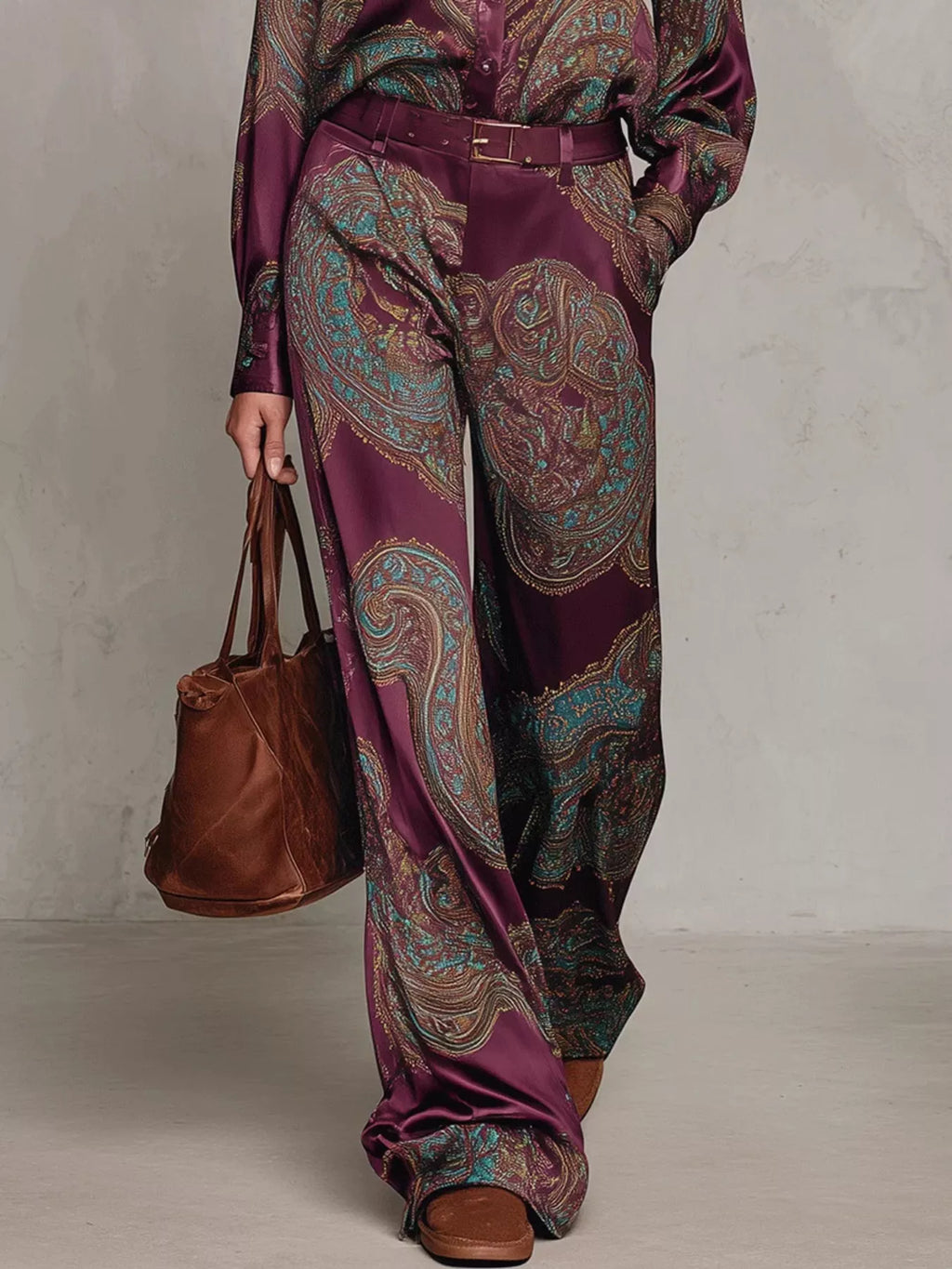 Close-up of burgundy paisley wide-leg pants