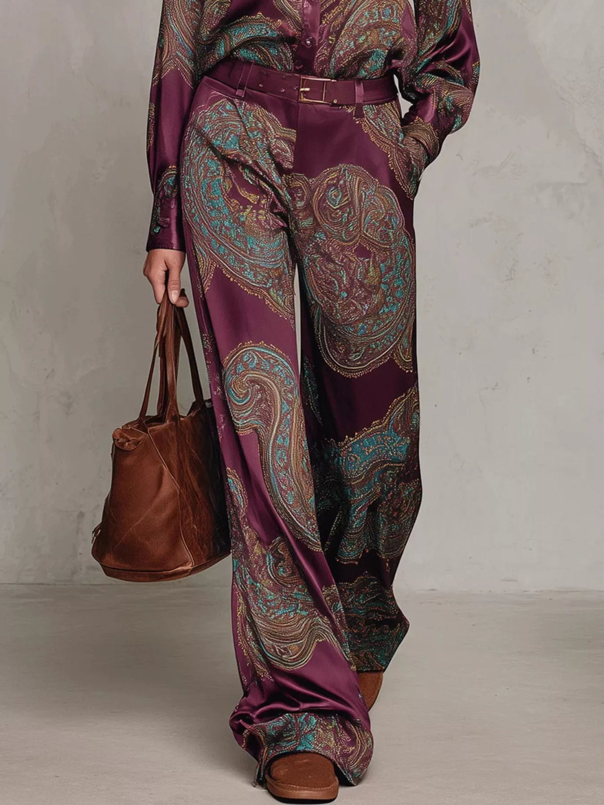 Close-up of burgundy paisley wide-leg pants