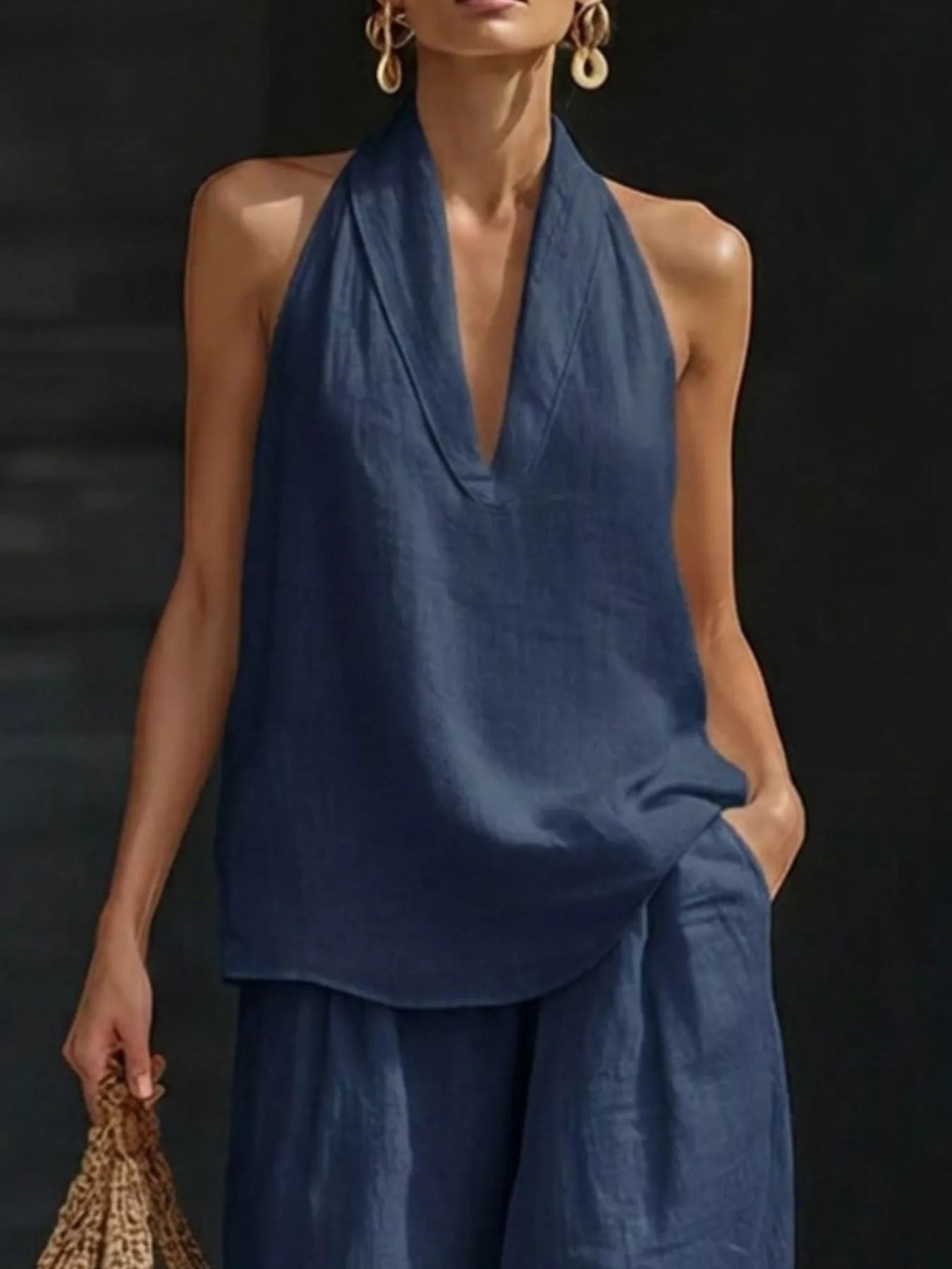 Plus-size halter-neck top and wide-leg pants set in navy by Trendsi