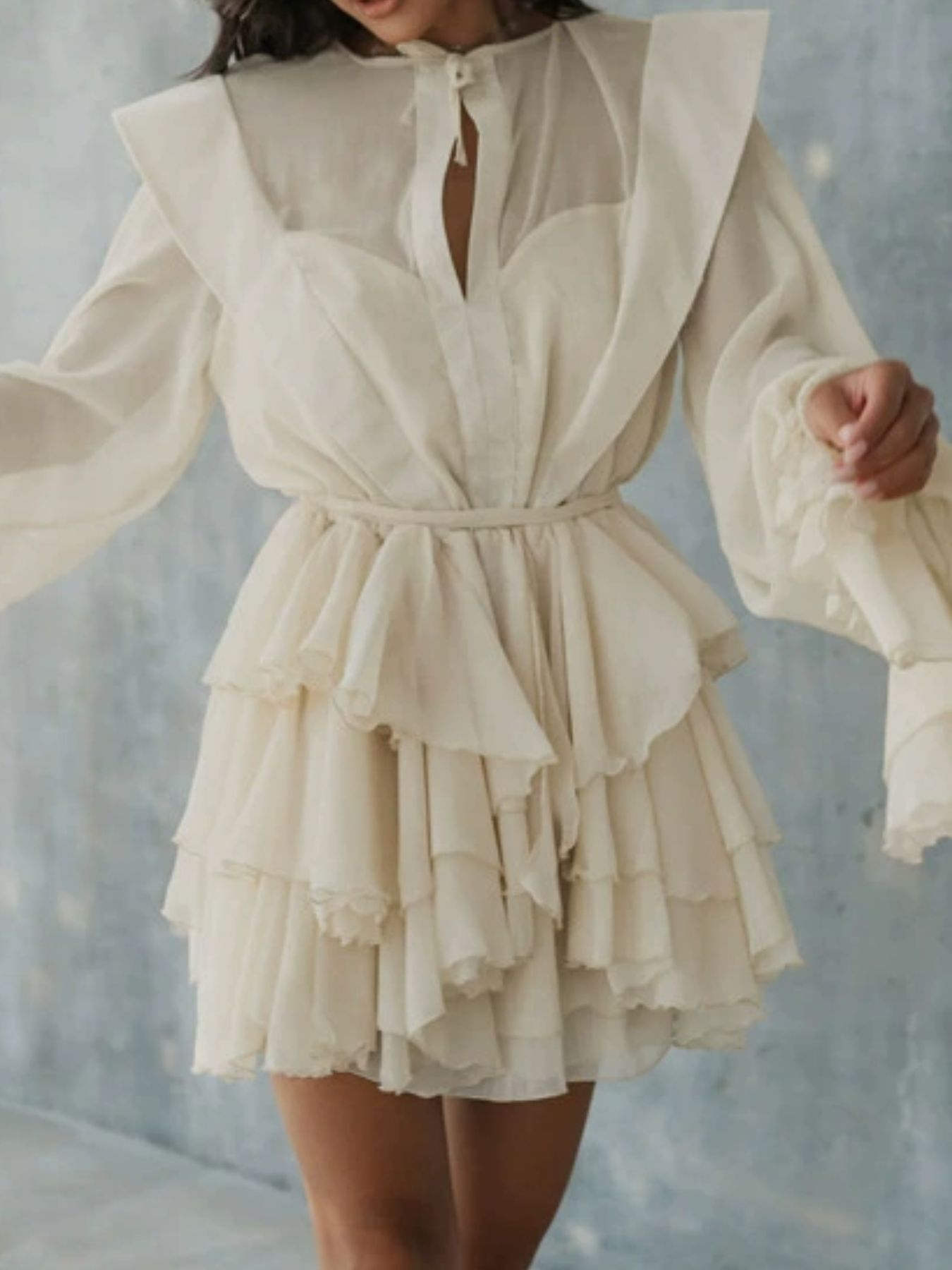 Ruffled Long Sleeve Mini Dress in ivory with tiered skirt and waist belt