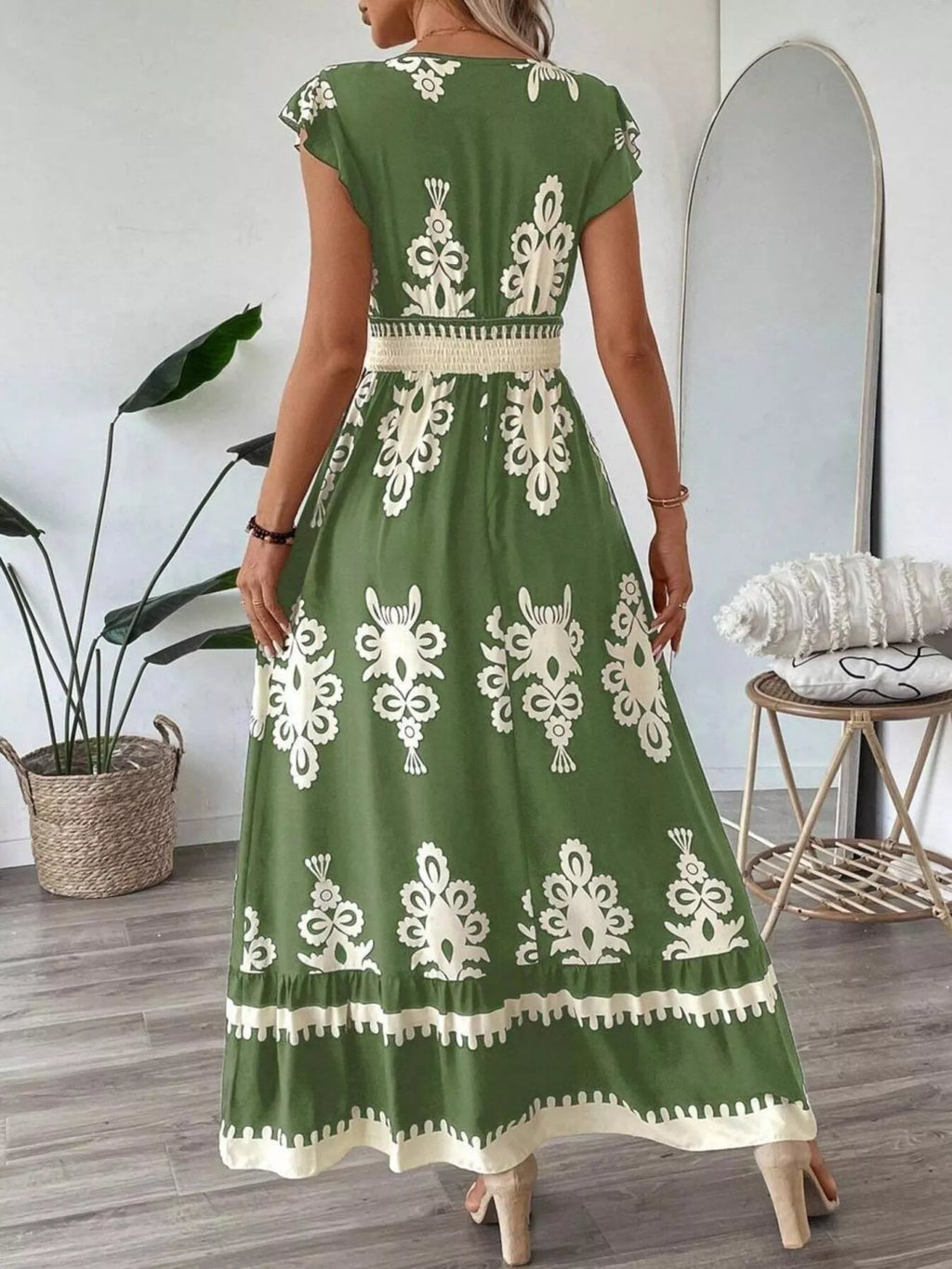 Printed green V-Neck Ruffled Cap Sleeve Dress with white ornate motif and smocked waist