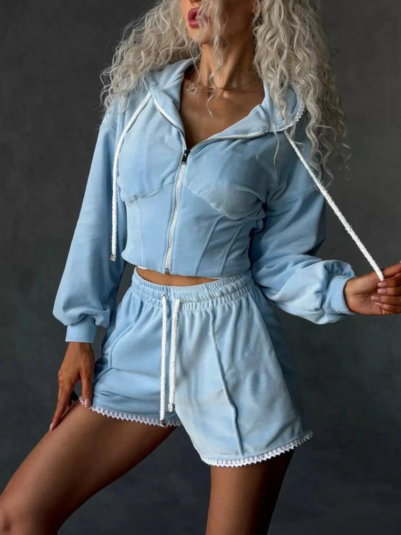 Zip Up Hooded Outerwear and Shorts Set, two-piece light blue velour activewear with white lace trim.