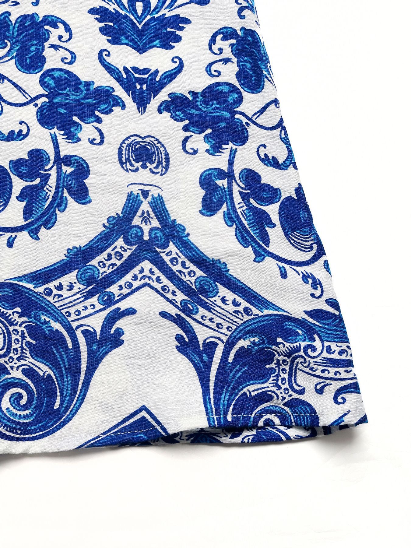 Printed halter-neck maxi dress in blue and white ornamental motif by Bellebijouix