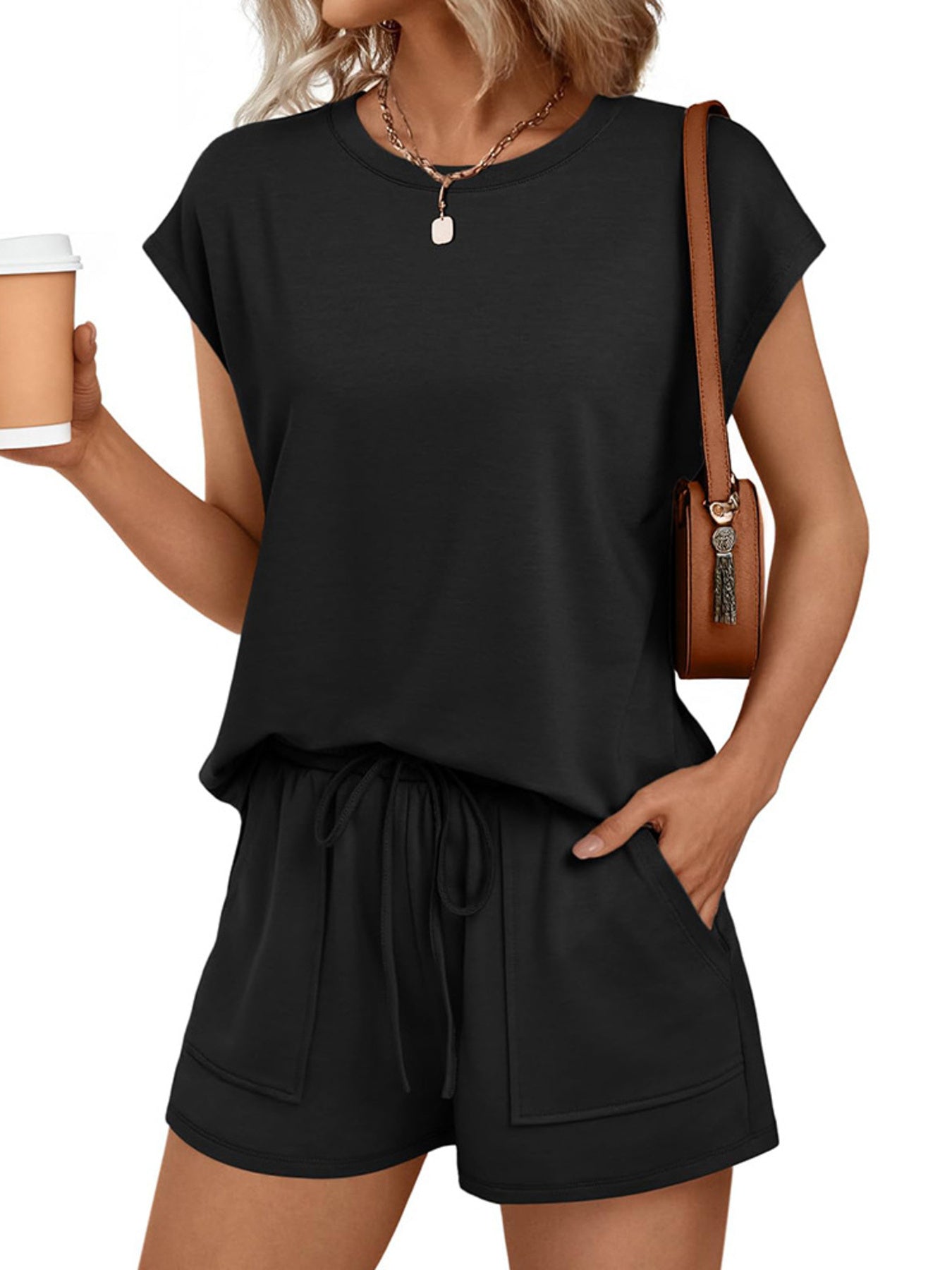 Round-neck cap-sleeve top and shorts set in black, two-piece by Trendsi.