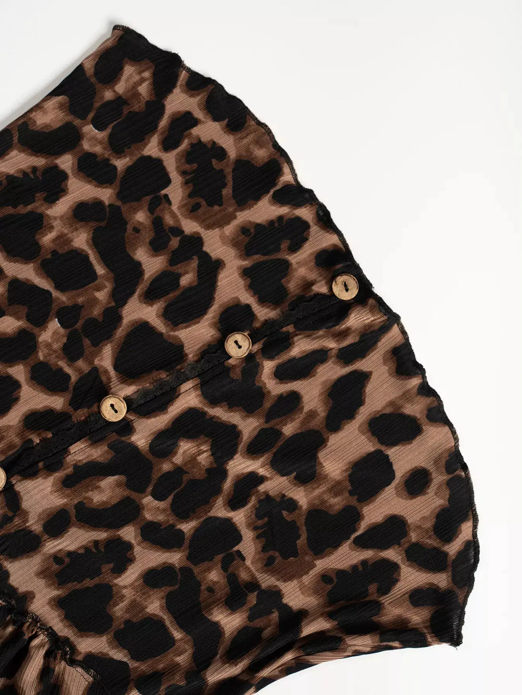 Leopard print button-down top by Belle Bijouix, sheer fabric with lace trim and buttons