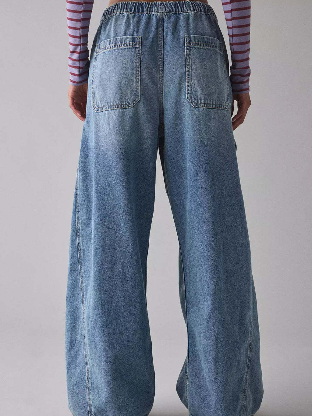 Drawstring Waist Cargo Jeans by Trendsi in light denim, back view with elastic waist and large patch pockets