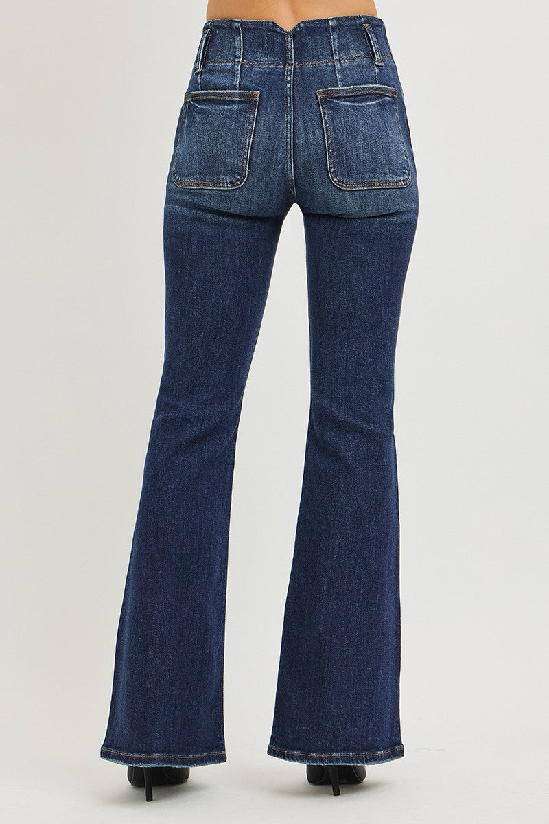 RISEN high-rise flare jeans with seam-detail waistband, back view in dark blue denim