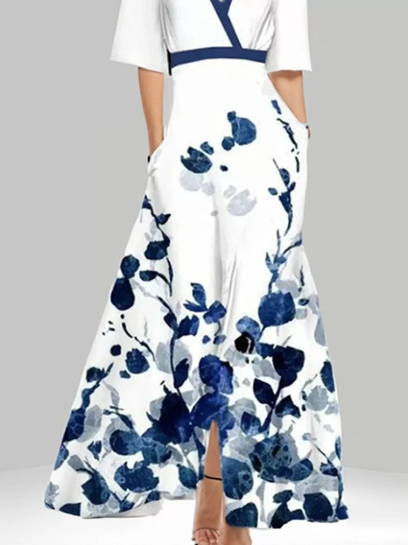Floral Print Half Sleeve Maxi Dress with Pockets by Trendsi; white base with blue floral print and navy waist trim.