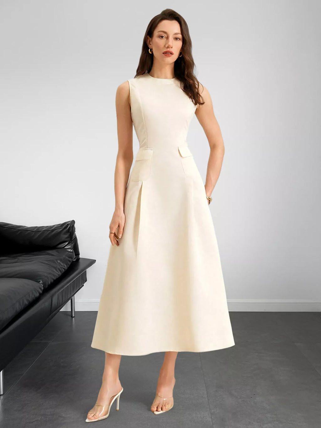Sleeveless A-Line Midi Dress with Pockets by Belle Bijouix in ivory cream worn by model.