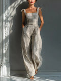 Khaki striped wide-leg jumpsuit with tie-shoulder detail - front view