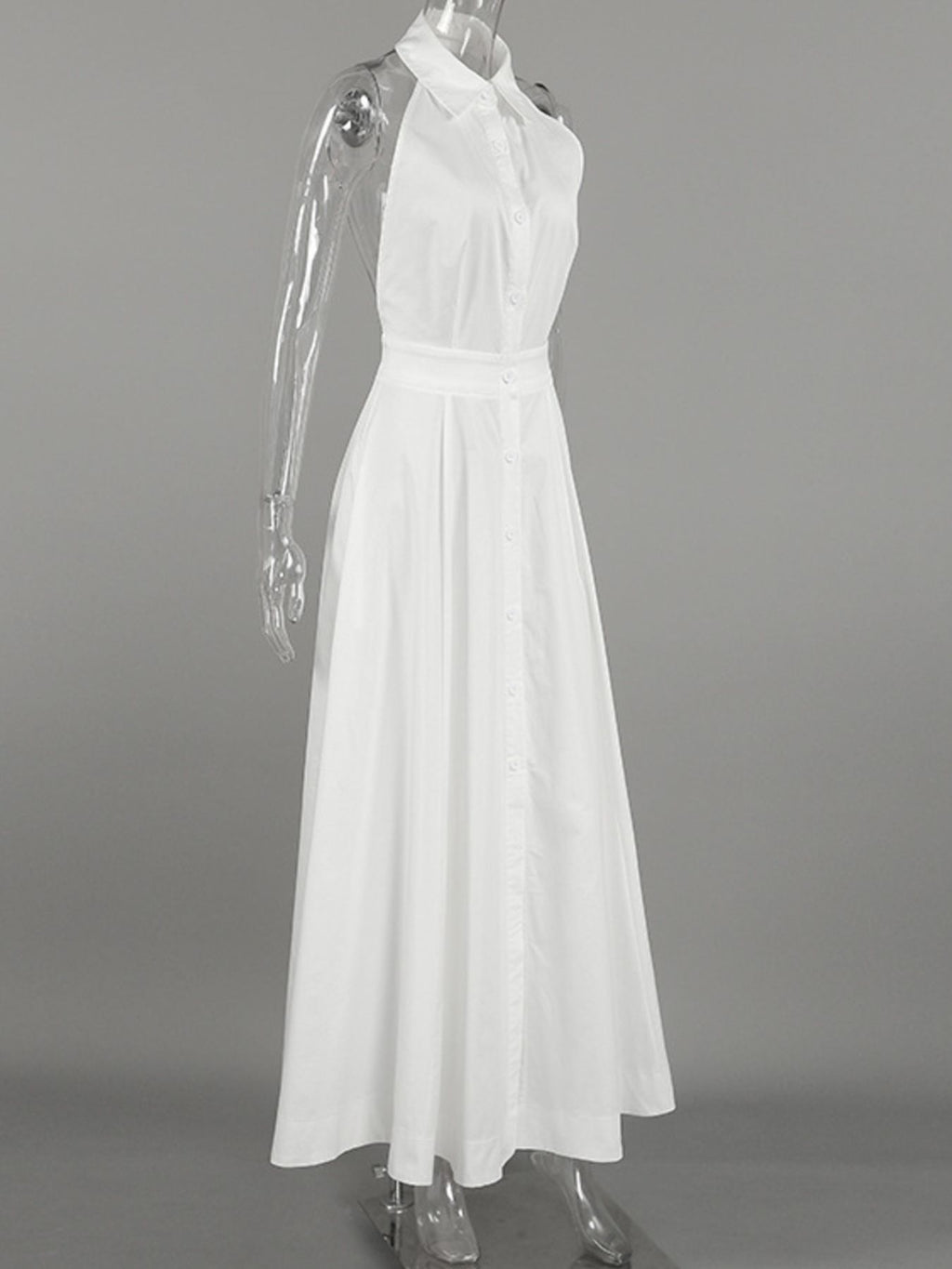 Backless sleeveless button-front maxi dress by Belle Bijouix in white on a clear mannequin