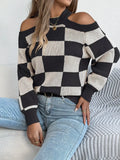 Cold shoulder checkered long-sleeve sweater by Belle Bijouix in black and cream knit