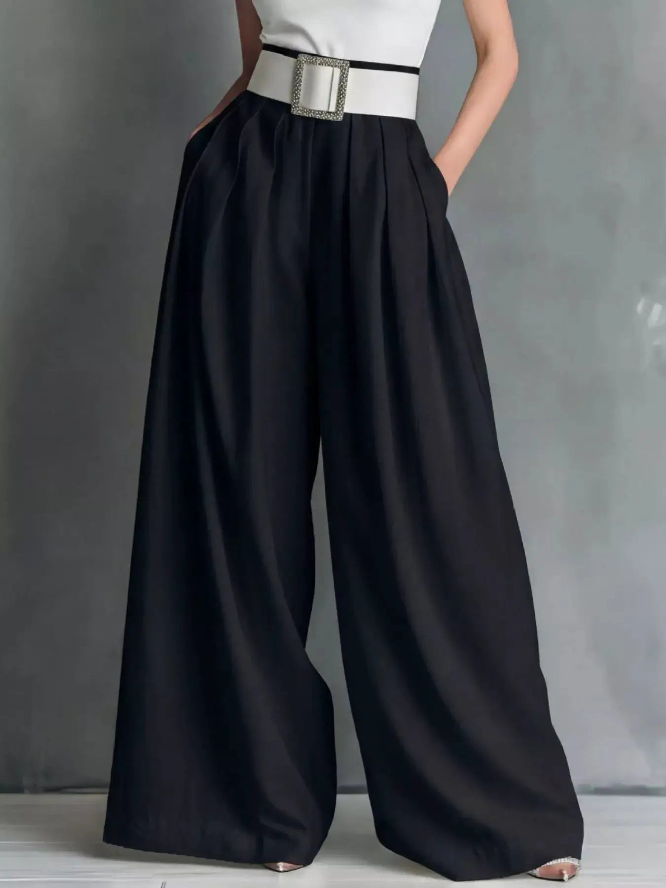 High-Waisted Wide-Leg Pants in black with a white jeweled-buckle belt.