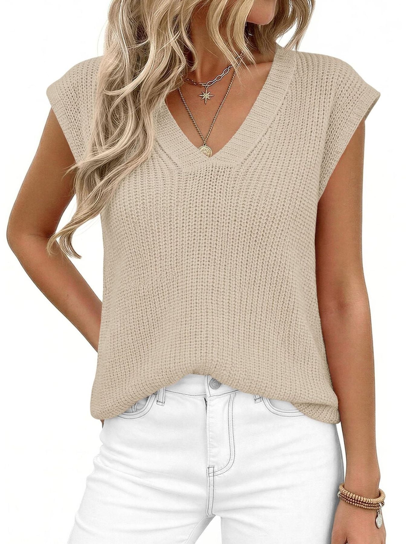 Trendsi beige knit V-neck sweater vest, sleeveless, paired with white jeans.