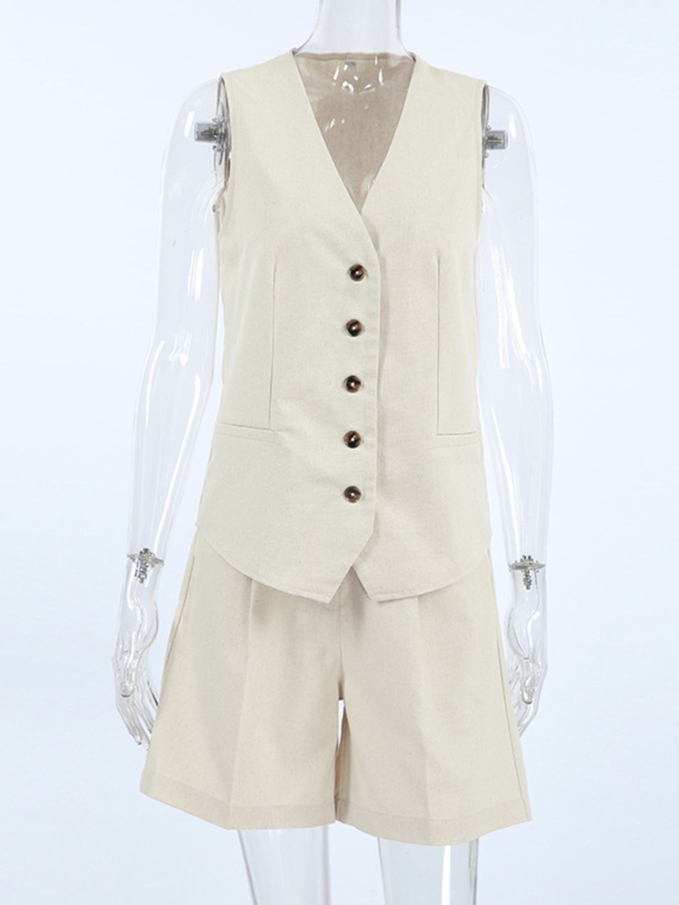 Two-piece Button Up Vest and Shorts Set by Belle Bijouix in beige; features front buttons and pocketed design