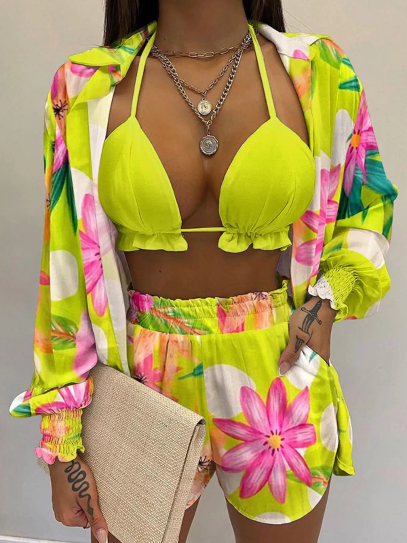 3-Piece neon lime halter cami outfit by Trendsi with floral-print shirt and matching shorts.