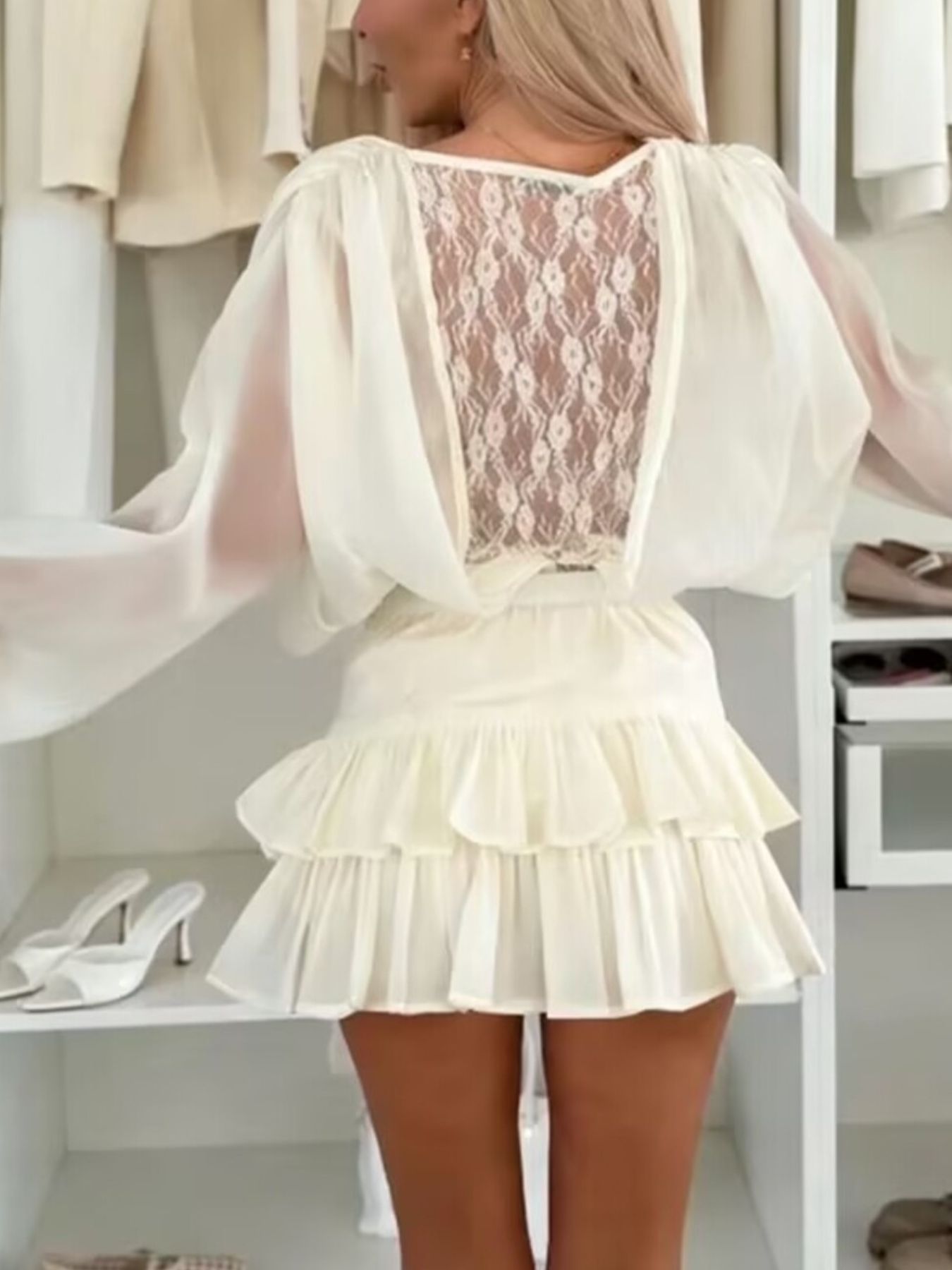 Lace long-sleeve dress by Belle Bijouix in ivory with short liner and tiered ruffle skirt