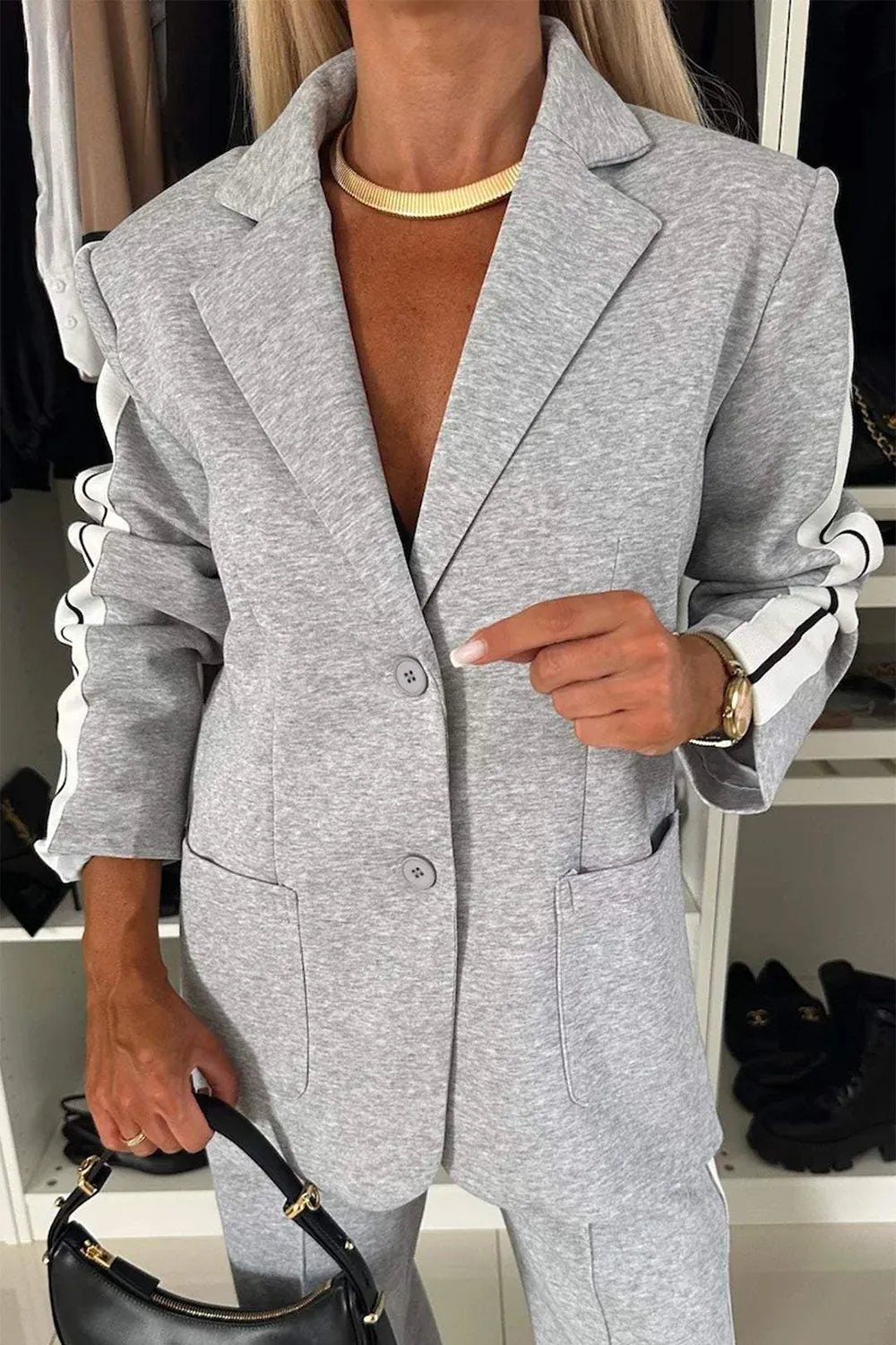 Full Size Contrast Lapel Collar Top and Pants Set in grey knit, blazer-style jacket with two buttons, pockets, and striped sleeve detail.